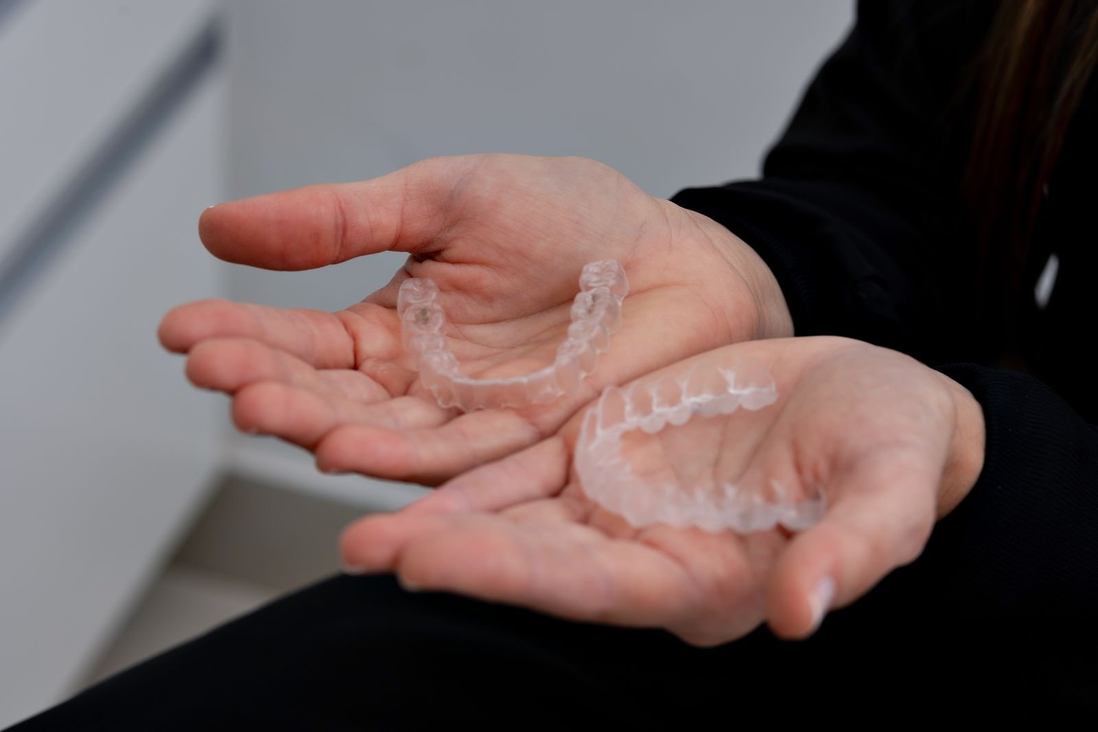 Close-up of clear Invisalign aligners