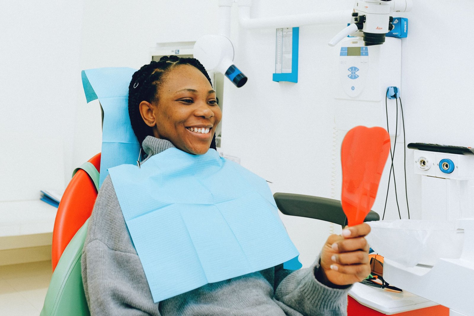Happy smiling patient at Pan American Dental